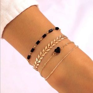 NWT Layered bracelet four piece set